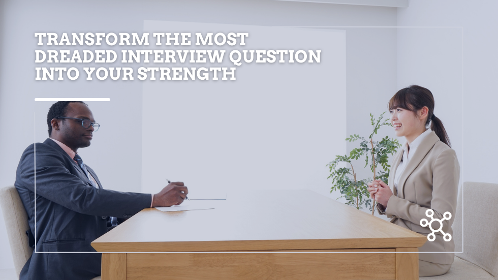 2 people sitting across a desk in an interview