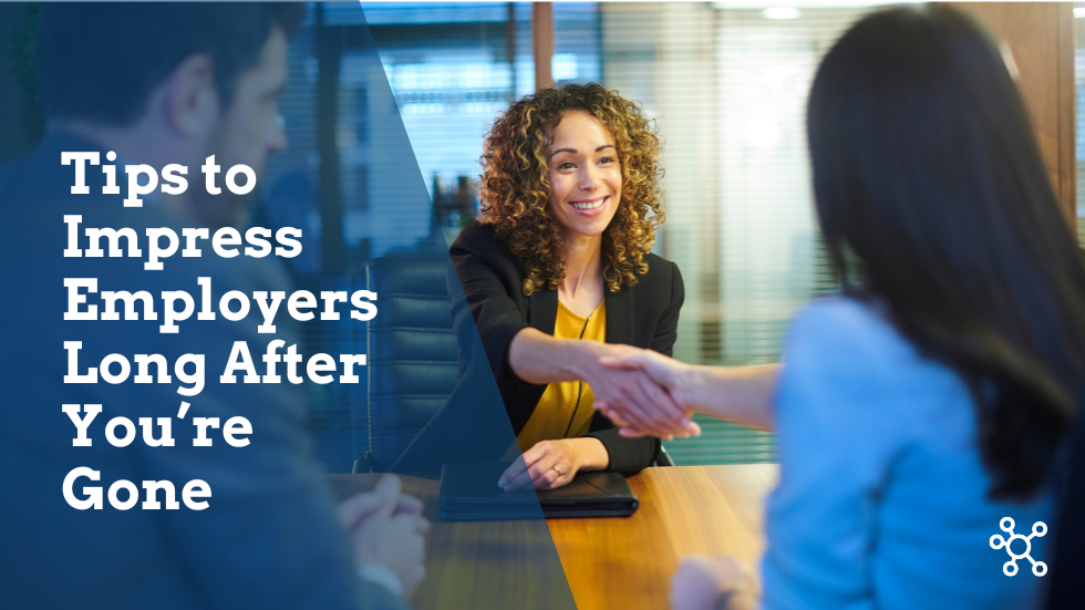 Individual shaking hands in a conference room for a meeting.
