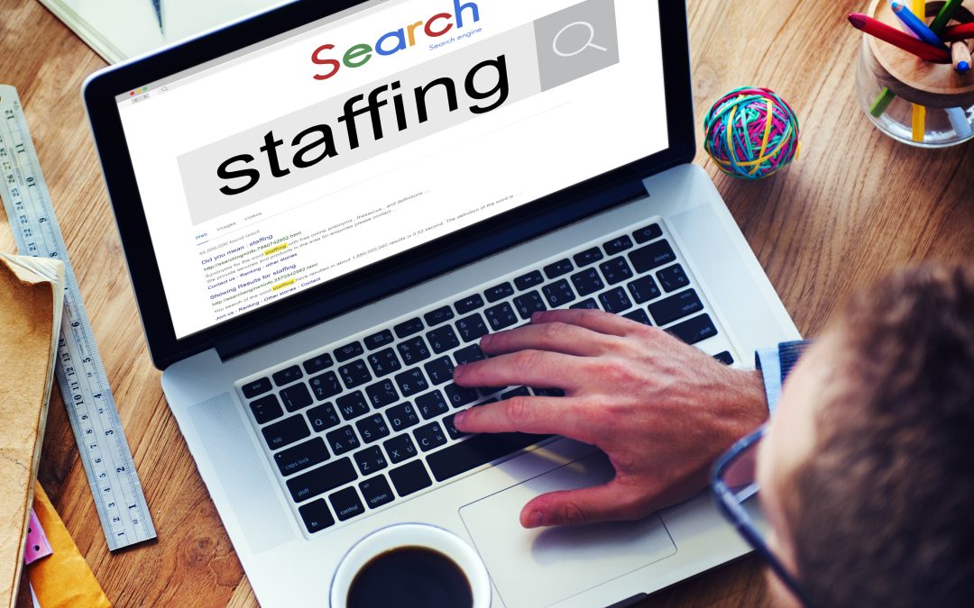 computer screen opened to staffing website