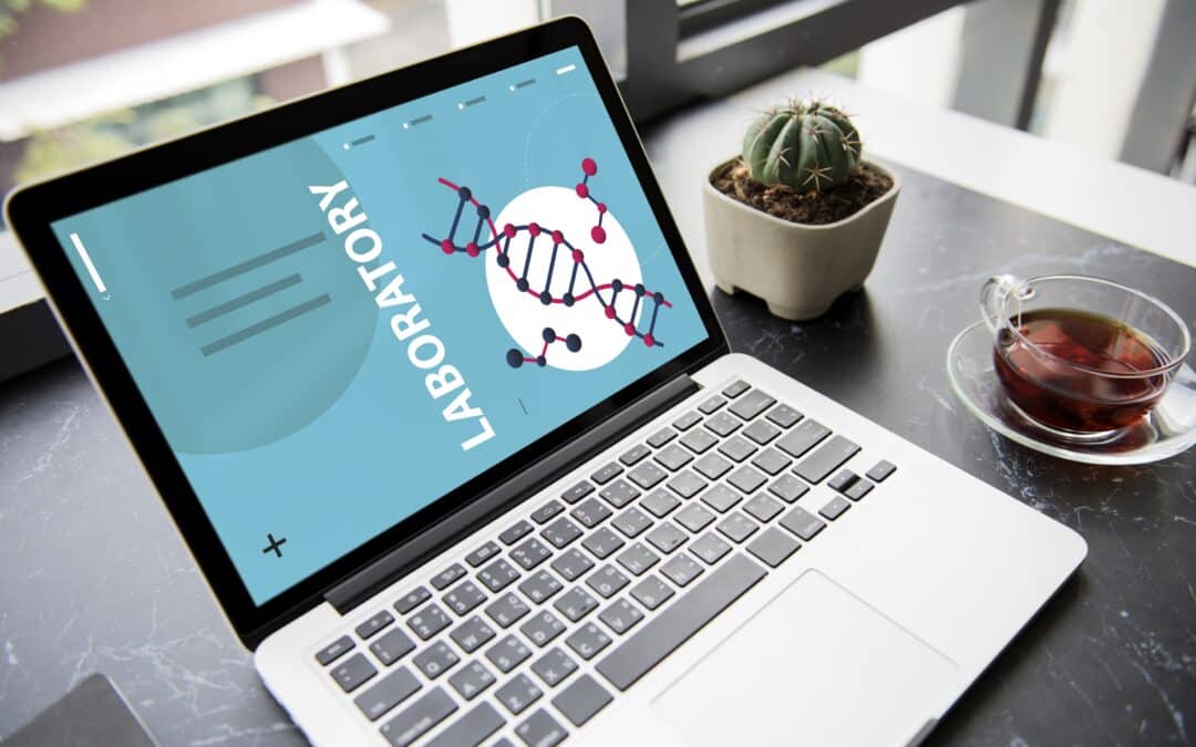 DNA strand symbol on a laptop re: biotech startups