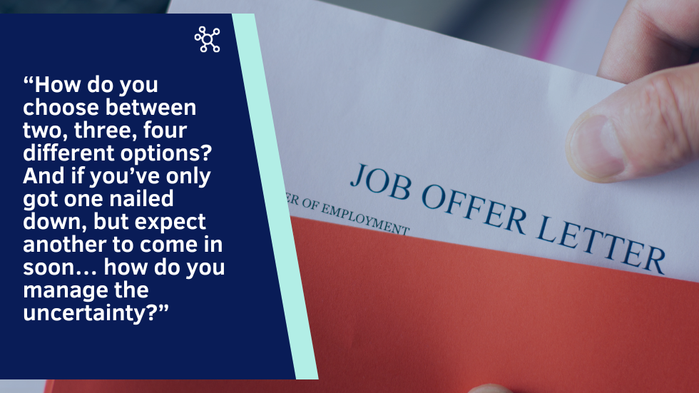 Job offer letter peeking out from within red folder